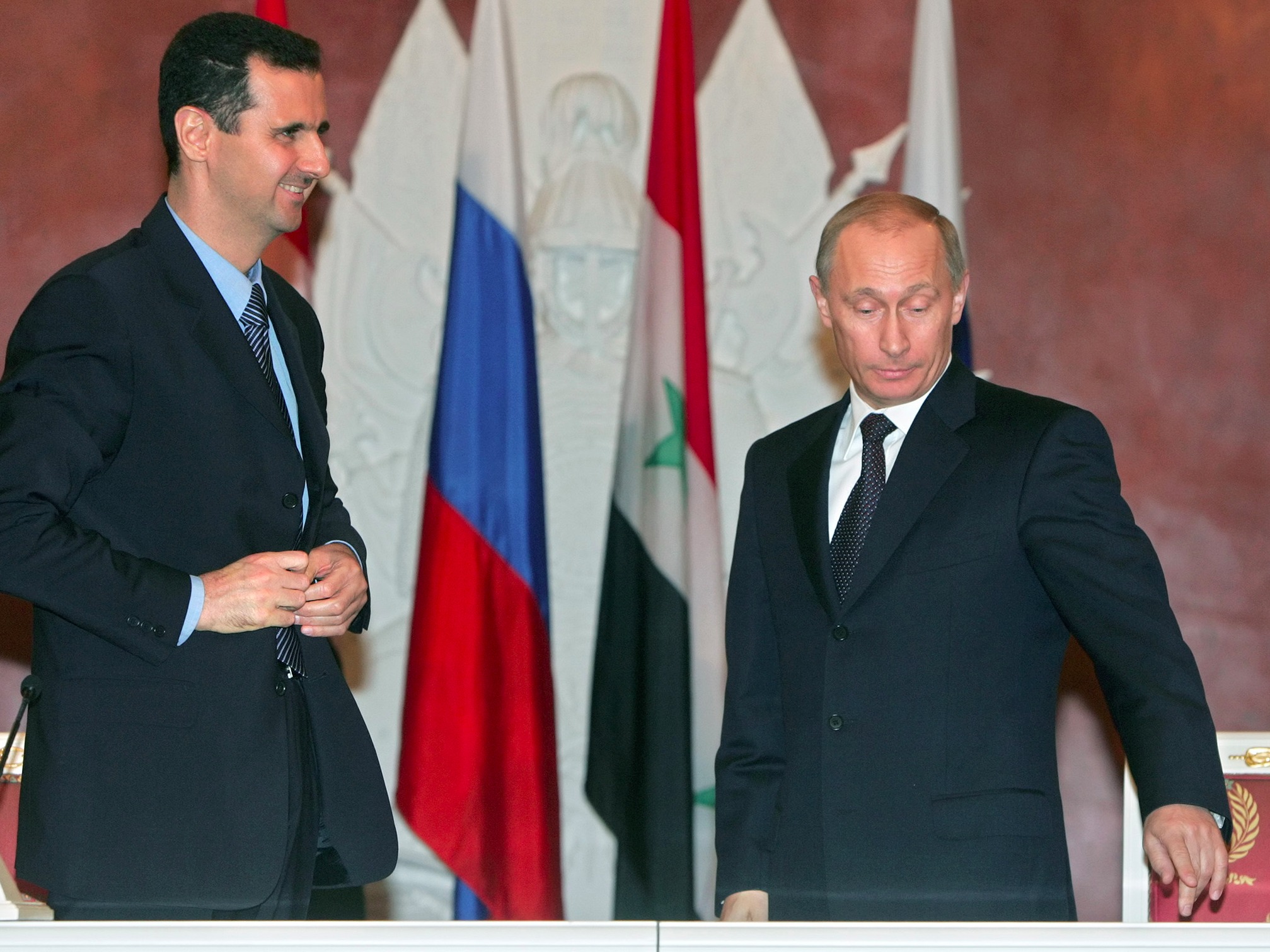 الرئيس السوري بشار الاسد رفقة فلاديمير بوتين