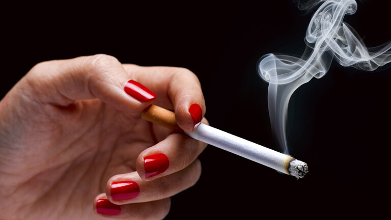 Why are women addicted to smoking more than men?