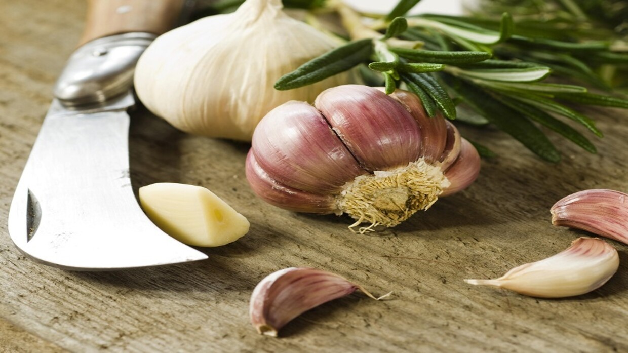 What happens when you eat two cloves of garlic daily?