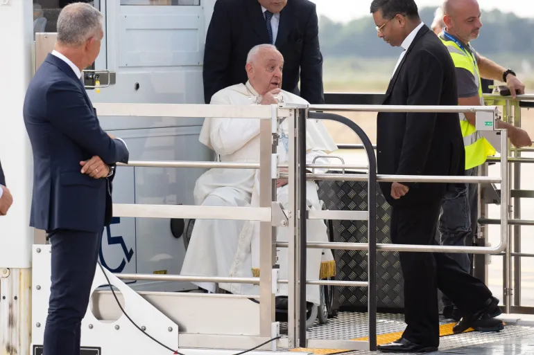 Pope Francis arrives in Indonesia, sets record at 87