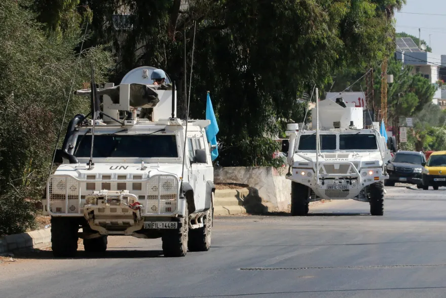 Peacekeeping forces withdraw from a site in southern Lebanon after Israeli forces opened fire on it